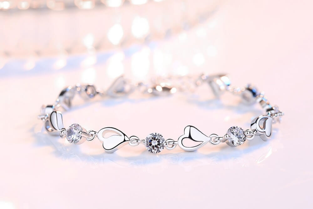 Zilveren Hartjesbangle in 925 Sterling Zilver – Elegante Armband Dames Minimalistische Cadeau Roze Blauw Wit | Sulvida