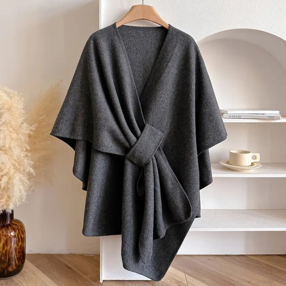 Geweven ponchowrap taupe grijs zwart ivoor dames omslagdoek oversized warm veelzijdig alle seizoenen stijlvol | Sulvida