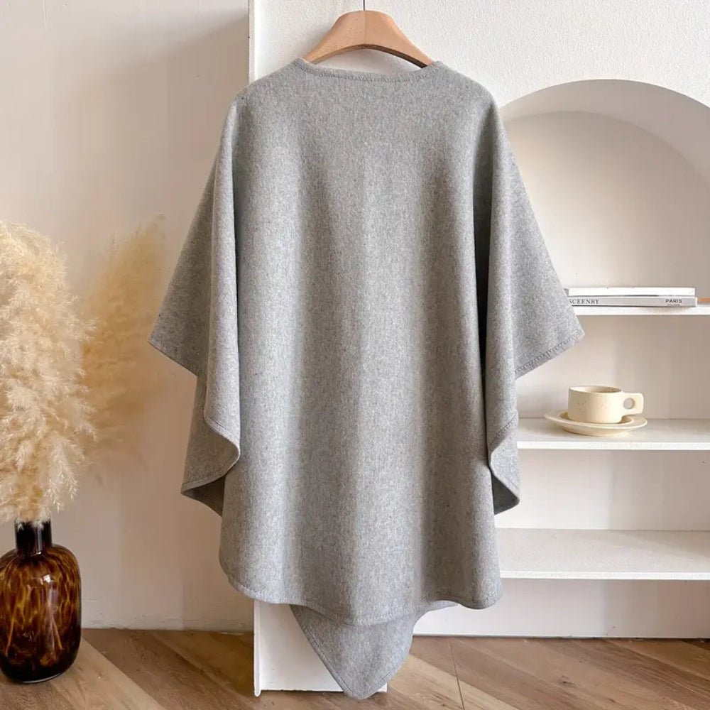 Geweven ponchowrap taupe grijs zwart ivoor dames omslagdoek oversized warm veelzijdig alle seizoenen stijlvol | Sulvida
