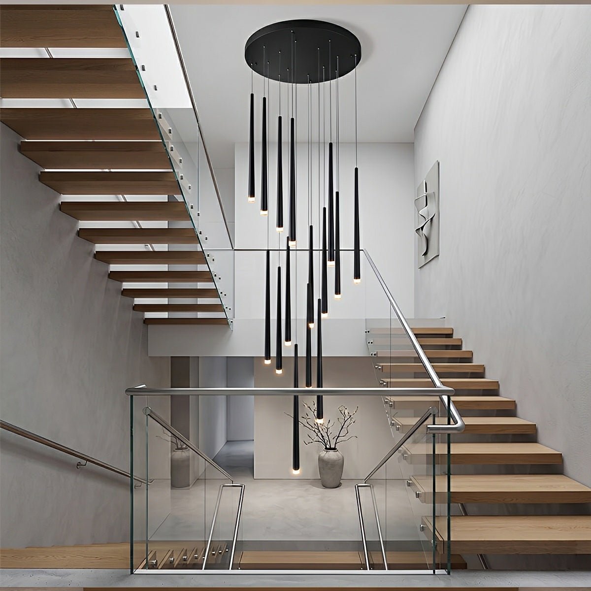 Verticale LED-hanglamp met cascaderende buizen voor trappenhuizen hoge ruimtes en grote open interieurs | Sulvida