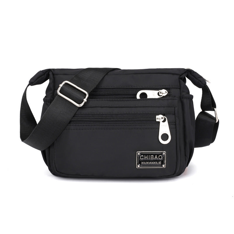 Sac bandoulière pour femme en nylon déperlant, plusieurs compartiments, sac de jour pratique, noir, gris, rouge, compact | Sulvida