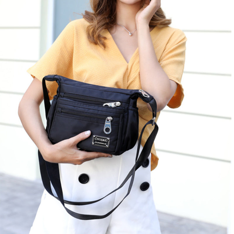 Sac bandoulière pour femme en nylon déperlant, plusieurs compartiments, sac de jour pratique, noir, gris, rouge, compact | Sulvida