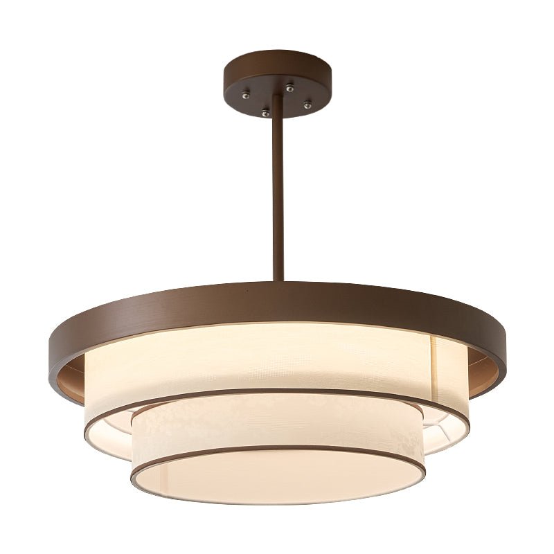 Hanglamp met gestapelde stoffen ringen en bronzen frame voor sfeervolle eetkamer en entree verlichting | Sulvida