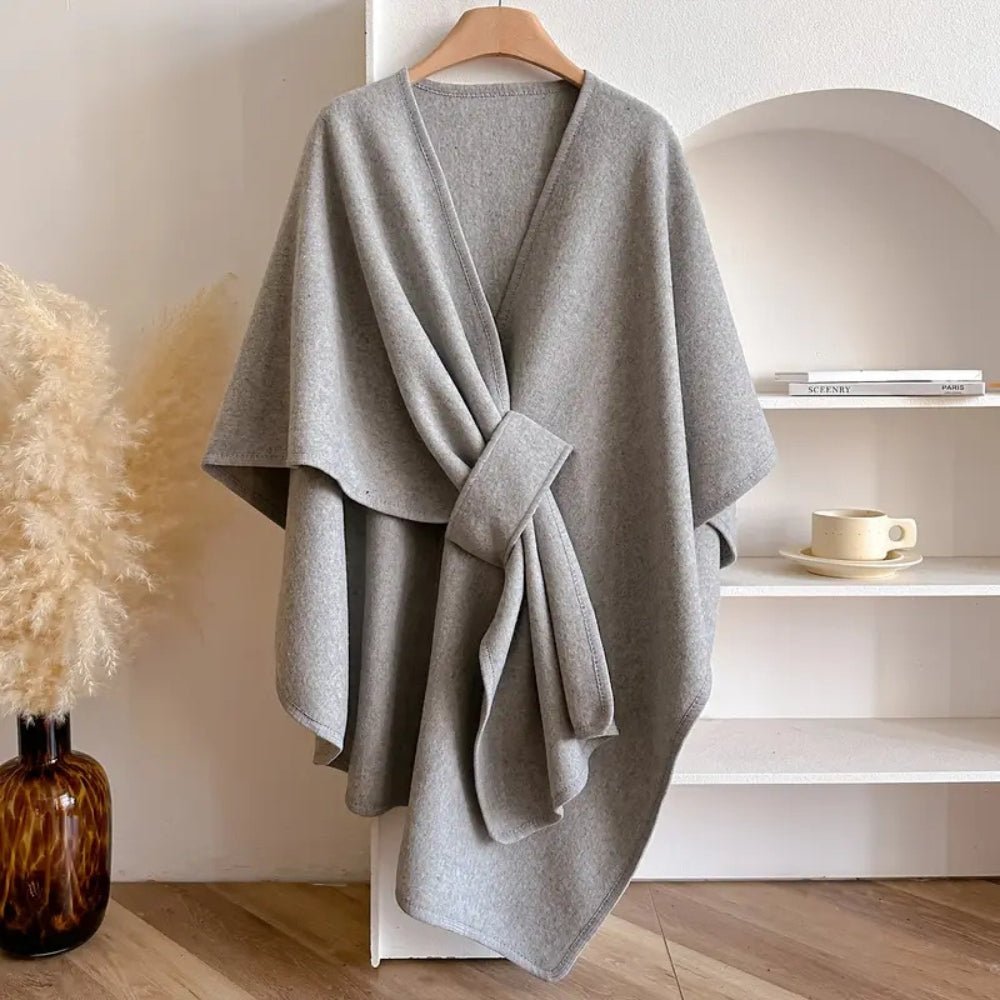 Geweven ponchowrap taupe grijs zwart ivoor dames omslagdoek oversized warm veelzijdig alle seizoenen stijlvol | Sulvida