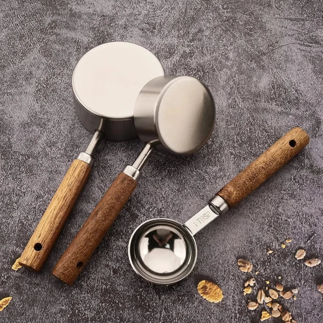 Edelstahl-Messlöffel-Set mit Holzgriff – 3-teiliges Küchenmesswerkzeug in Schwarz, Gold und Silber | Sulvida