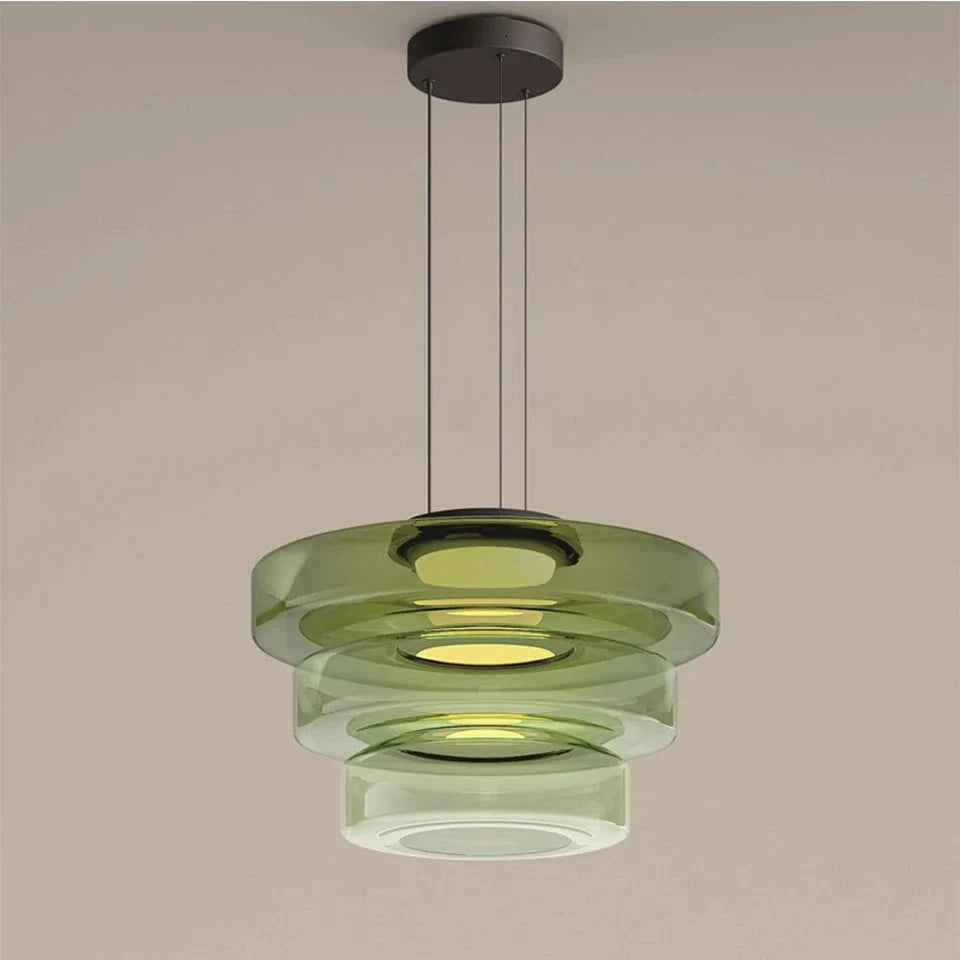 Glazen hanglamp met gelaagde kap in amber groen of grijs voor sfeervolle verlichting eetkamer woonkamer | Sulvida