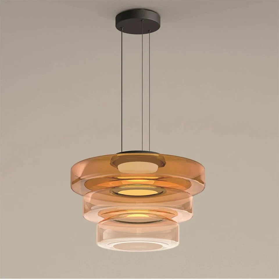 Glazen hanglamp met gelaagde kap in amber groen of grijs voor sfeervolle verlichting eetkamer woonkamer | Sulvida