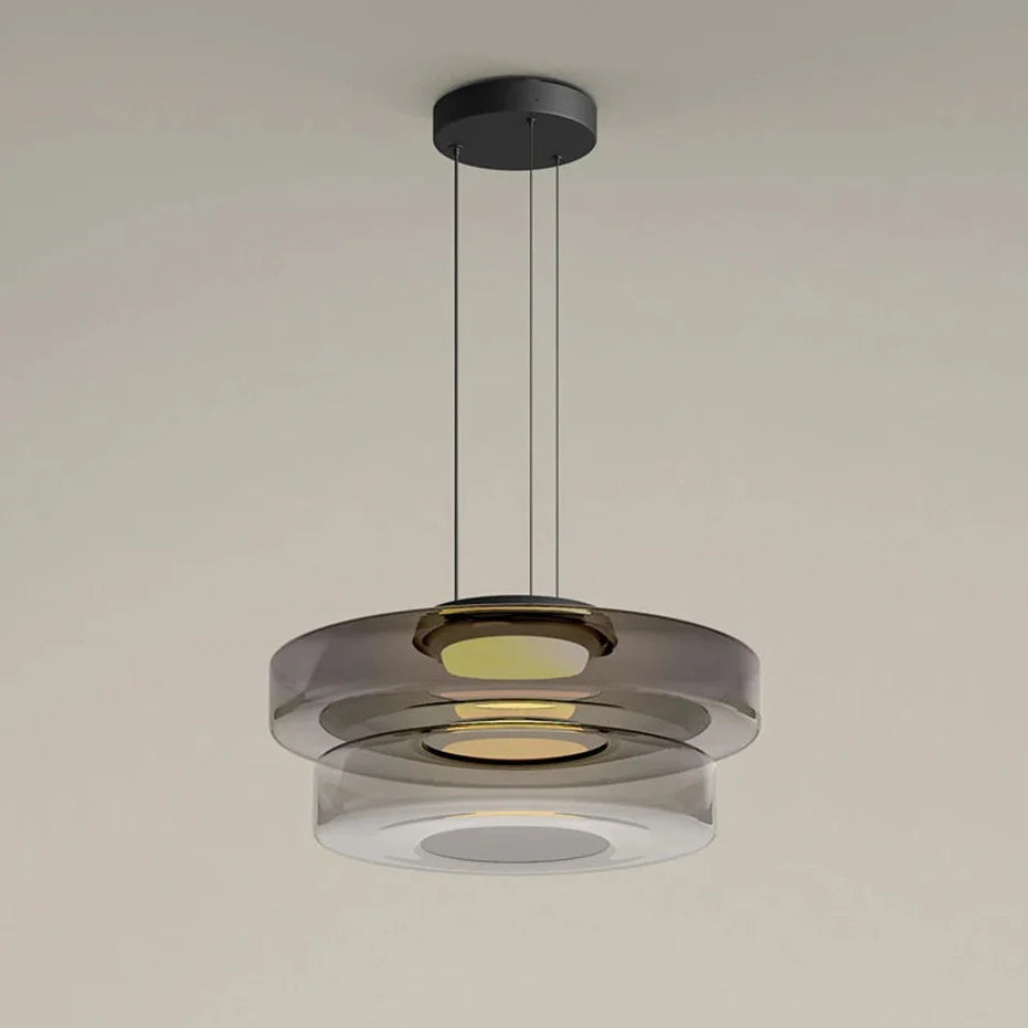 Glazen hanglamp met gelaagde kap in amber groen of grijs voor sfeervolle verlichting eetkamer woonkamer | Sulvida