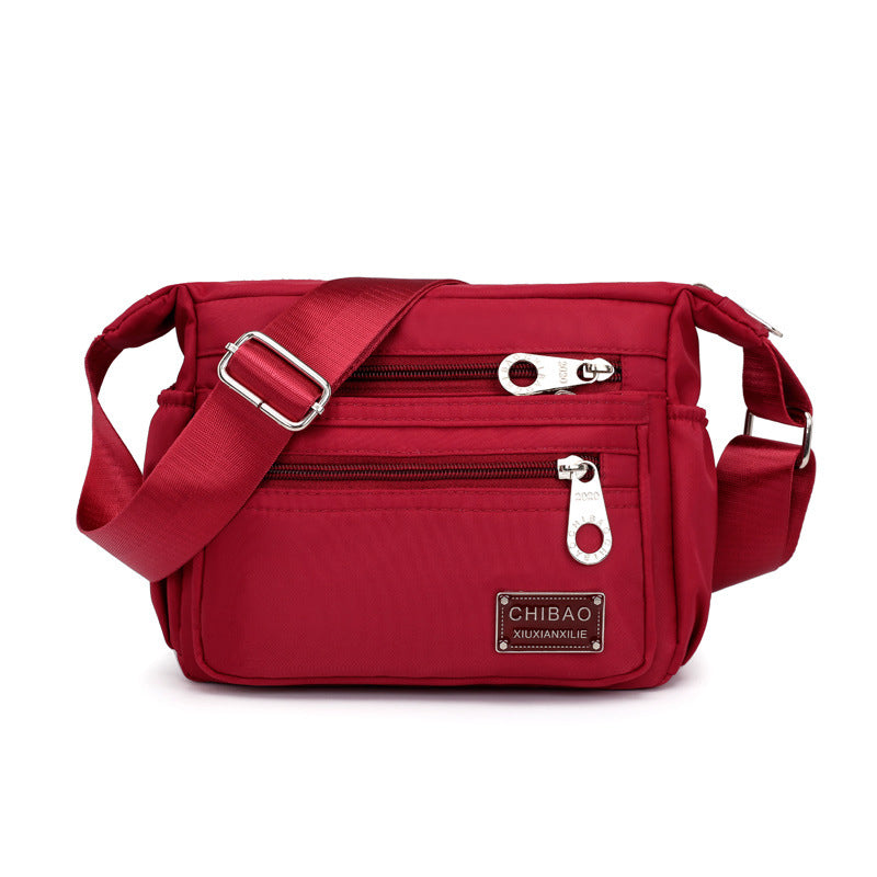 Sac bandoulière pour femme en nylon déperlant, plusieurs compartiments, sac de jour pratique, noir, gris, rouge, compact | Sulvida