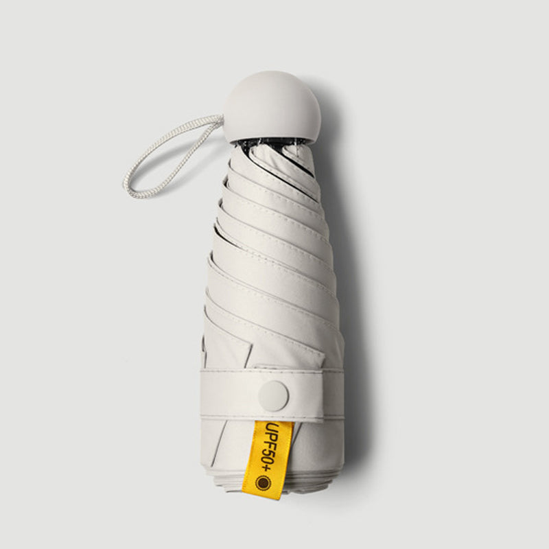 Zakparaplu Compact Capsule met UV-Bescherming UPF50+ Windbestendig Opvouwbaar Regenparaplu voor Onderweg | Sulvida